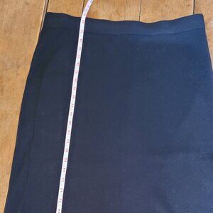 Black knit bodycon skirt midi-length